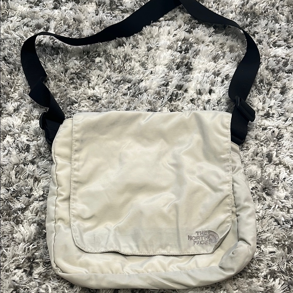 The North Face Cream Canvas Messenger Bag with Adjustable Strap